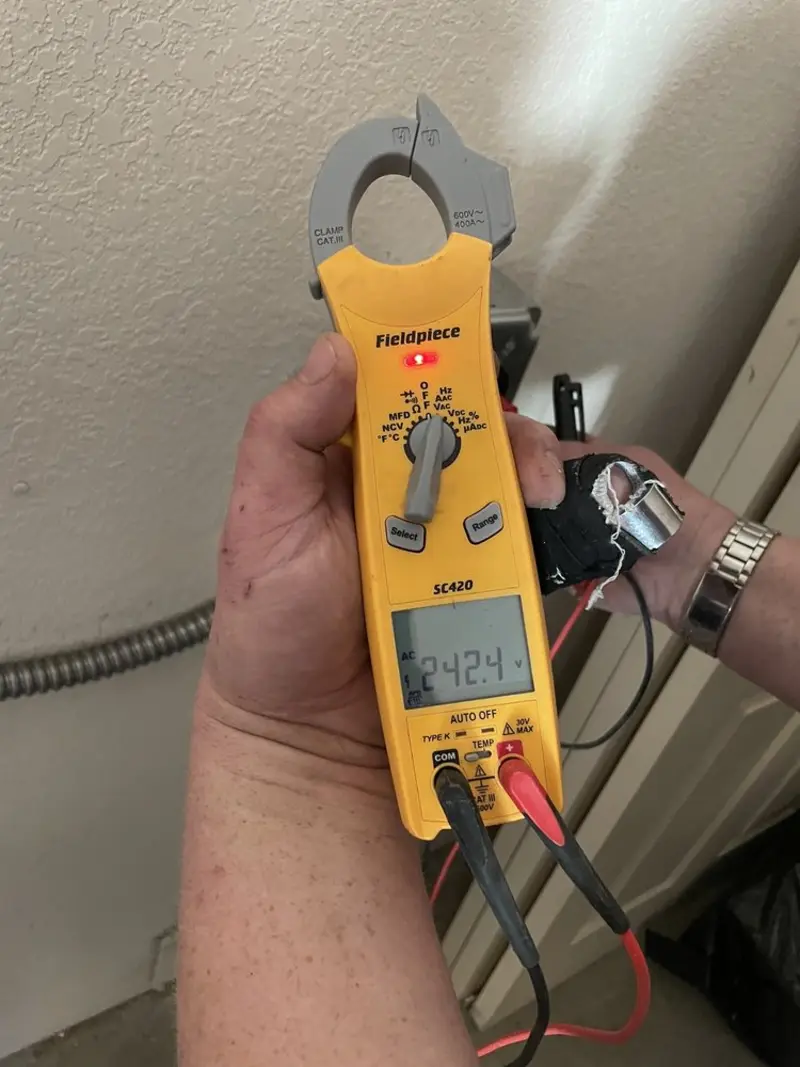 Voltage testing with clamp meter during Circuit Breaker Repair in Centerville